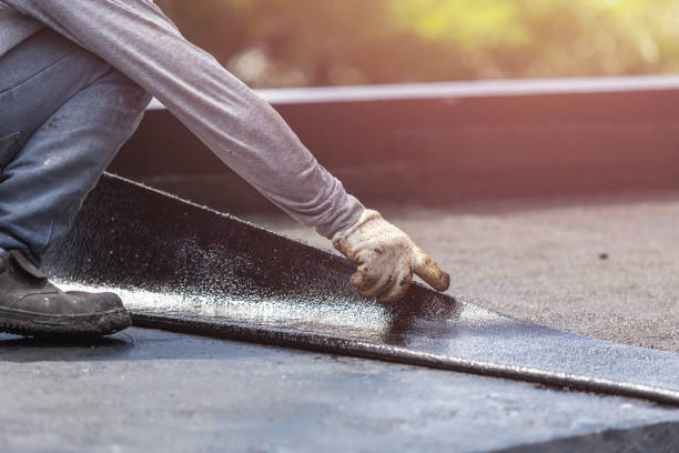 Professional Basement Waterproofing technician working in New Holstein, WI